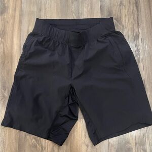 Awesome Lululemon shorts with compression liner. Unworn. Black. Medium